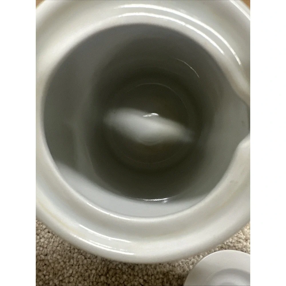 Vintage cream pitcher in the retro floral, manufactured by Suisse Langenthal